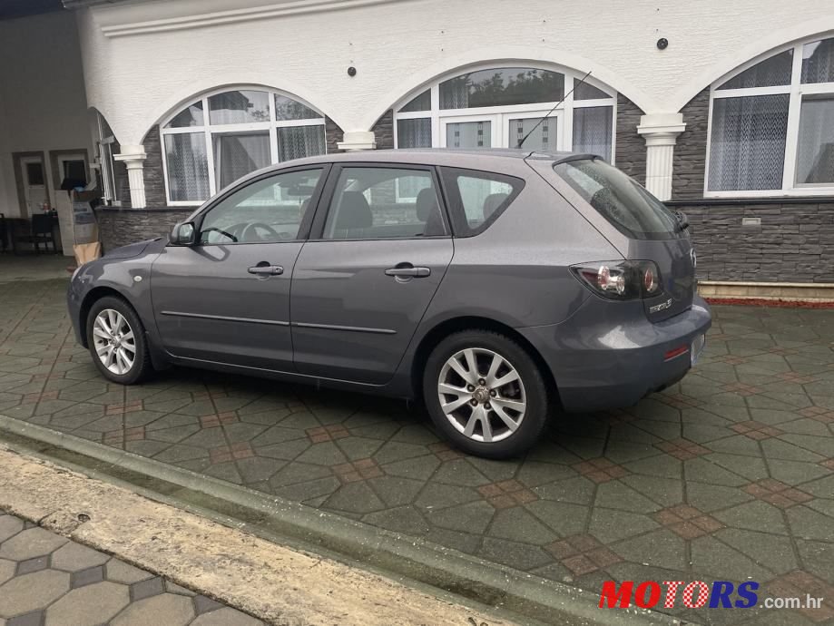 2006' Mazda 3 16D photo #5