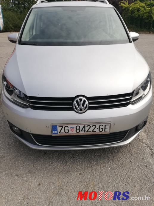 2014' Volkswagen Touran 1,6 Tdi photo #1
