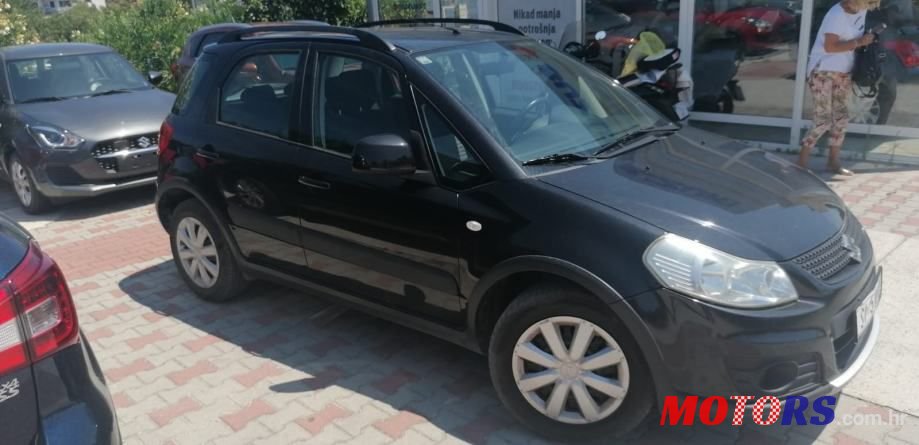 2013' Suzuki SX4 1,6 Glx photo #1