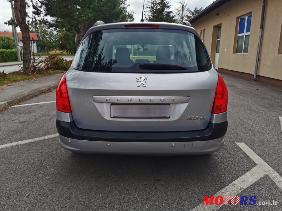 2011' Peugeot 308 Sw photo #6