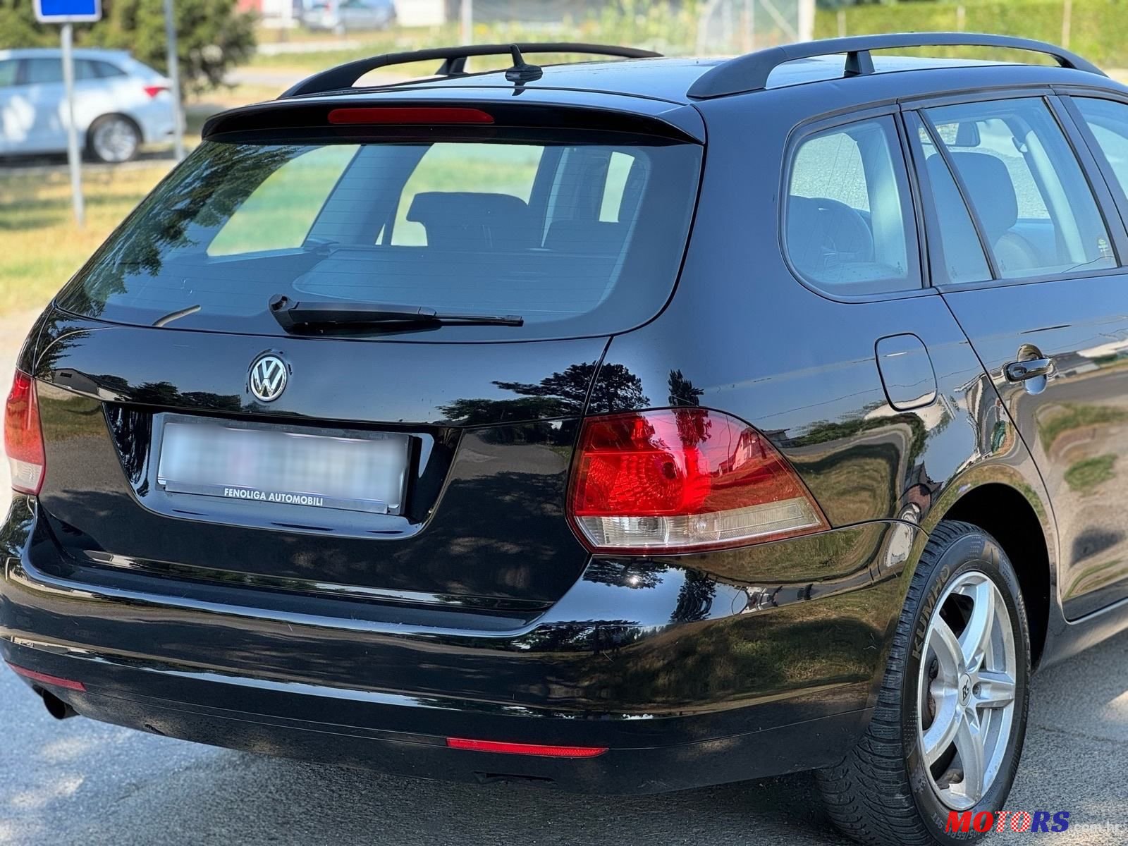 2011' Volkswagen Golf VI Variant photo #5