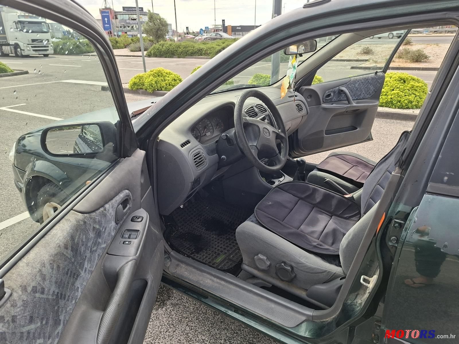 1999' Mazda 323 1.3 Ce 4T photo #6