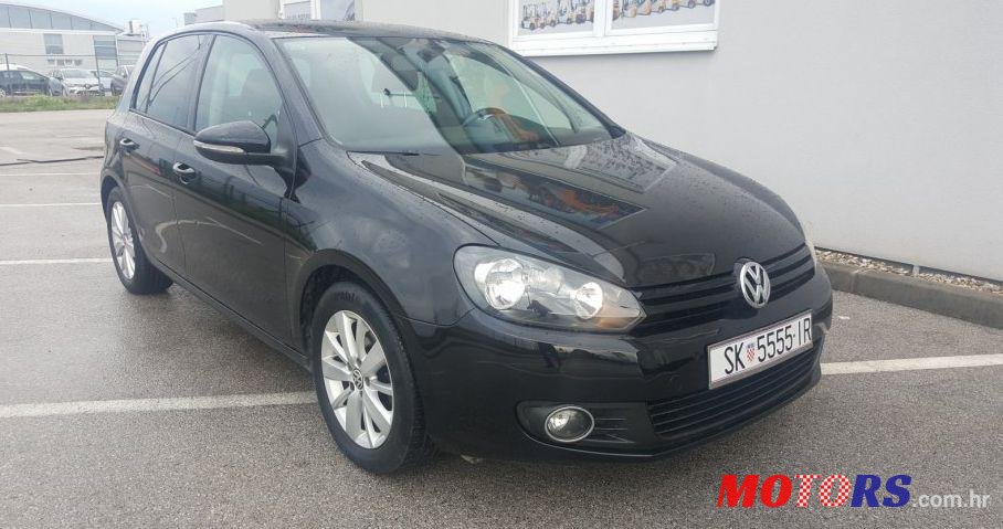 2011' Volkswagen Golf VI 1,6 Tdi photo #1