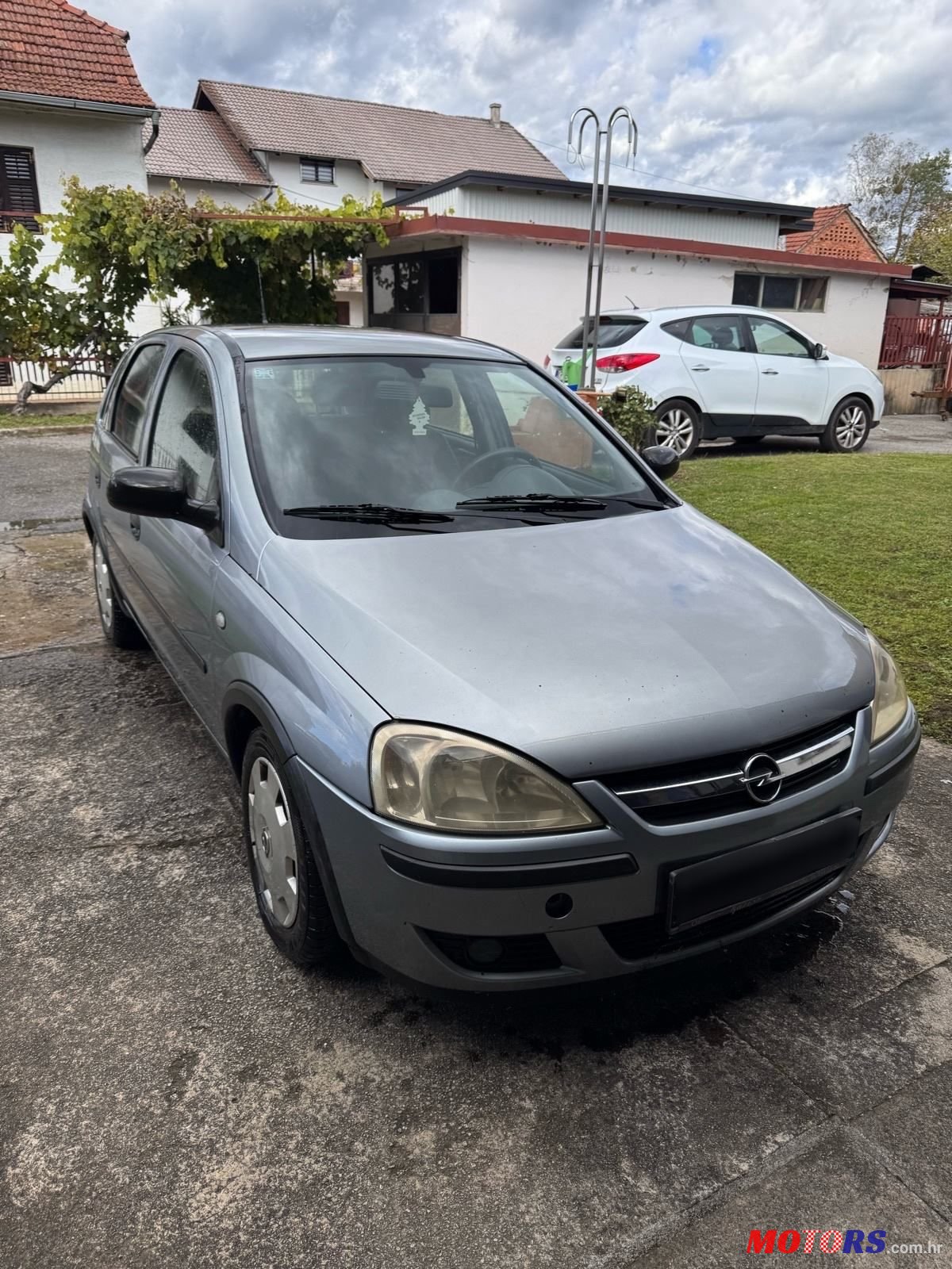 2004' Opel Corsa 1,3 Cdti photo #2