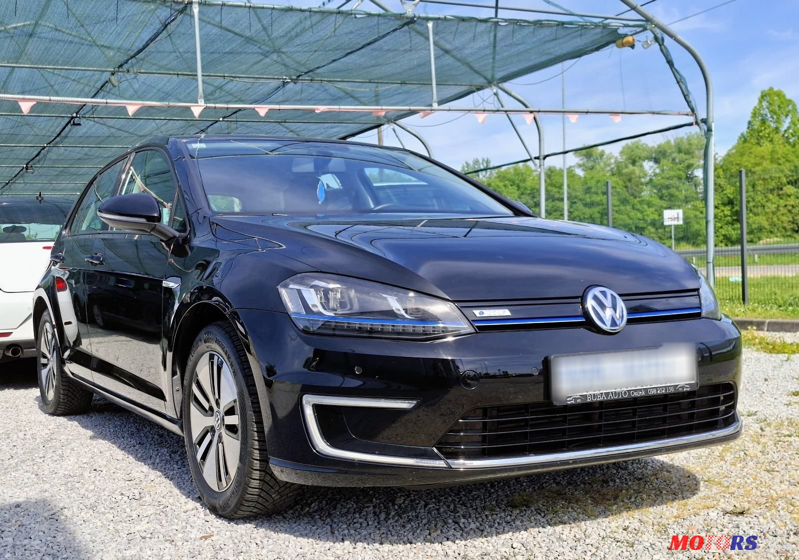 2017' Volkswagen Golf VII E-Golf photo #3
