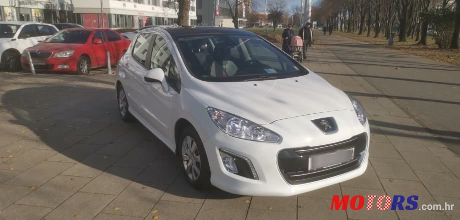 2012' Peugeot 308 photo #1