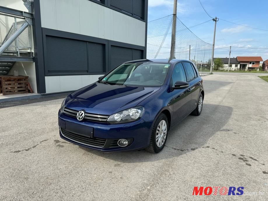 2011' Volkswagen Golf VI 1,6 Tdi photo #1