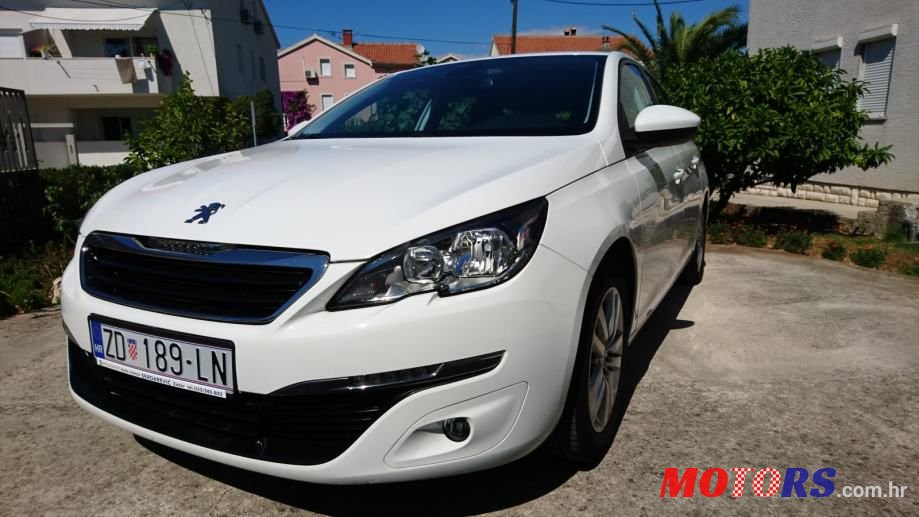 2016' Peugeot 308 Sw photo #1