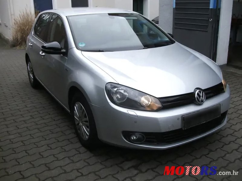 2012' Volkswagen Golf VI 1,6 Tdi photo #3