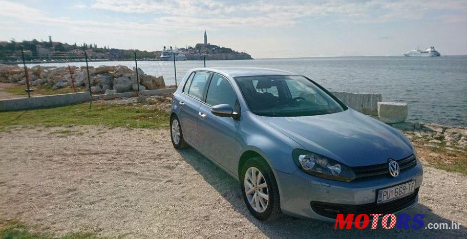 2011' Volkswagen Golf VI 1,6 Tdi photo #1
