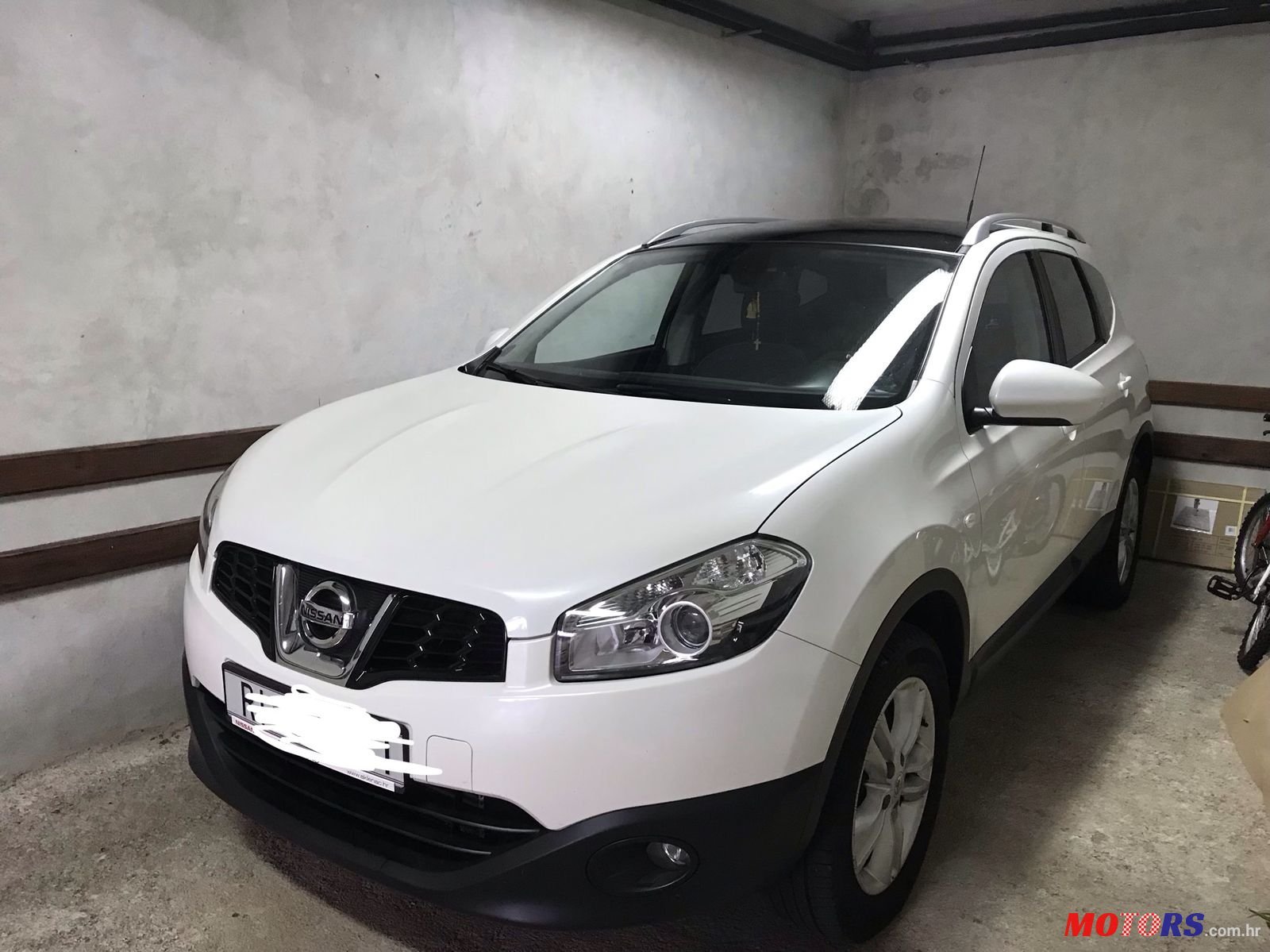 2014' Nissan Qashqai+2 4x4 photo #1