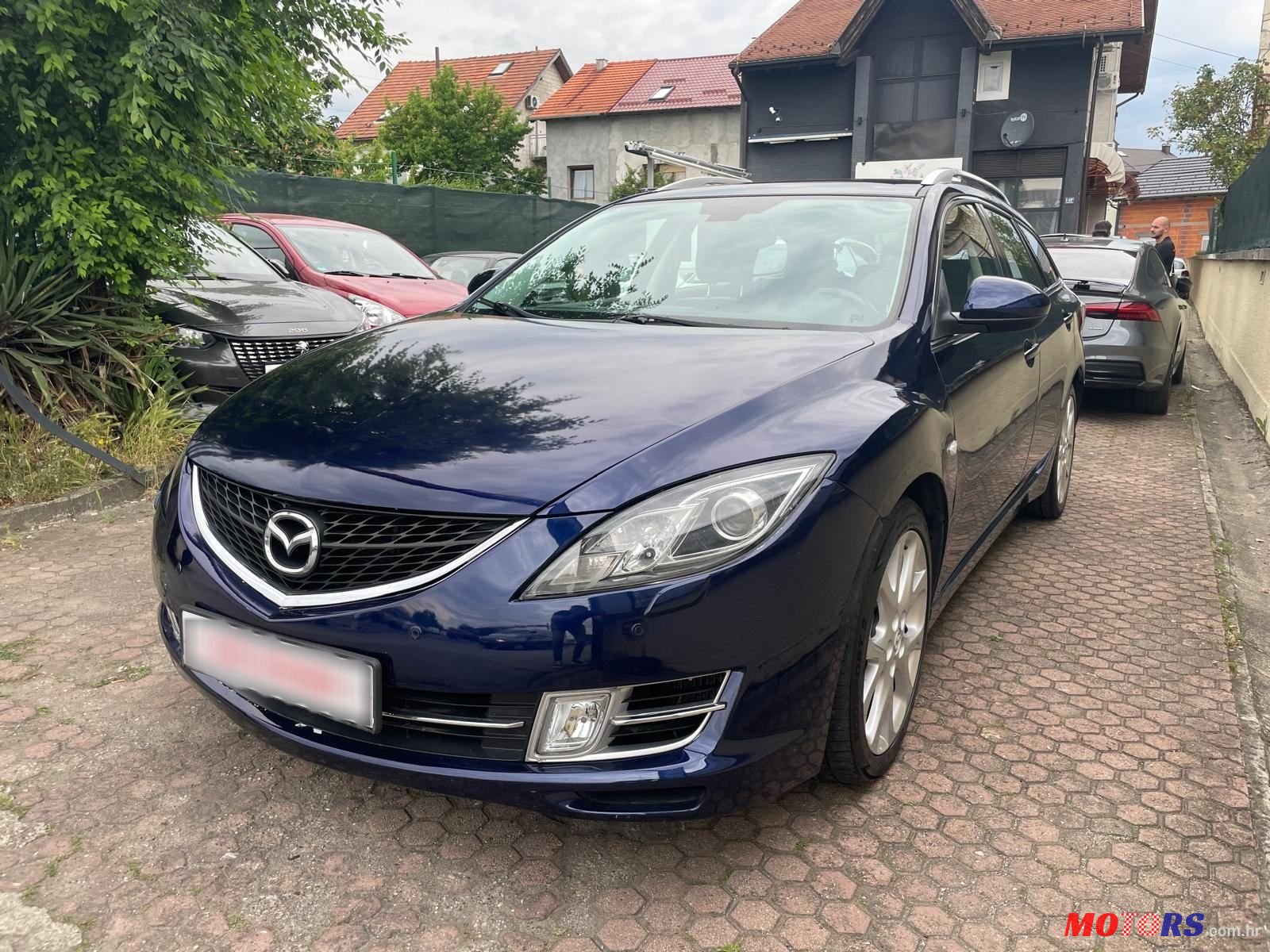 2009' Mazda 6 Sport Combi photo #1