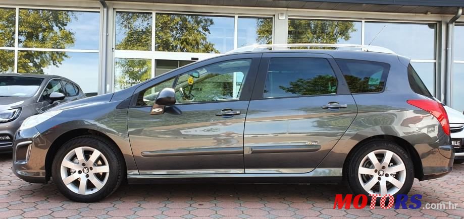 2012' Peugeot 308 Sw photo #2