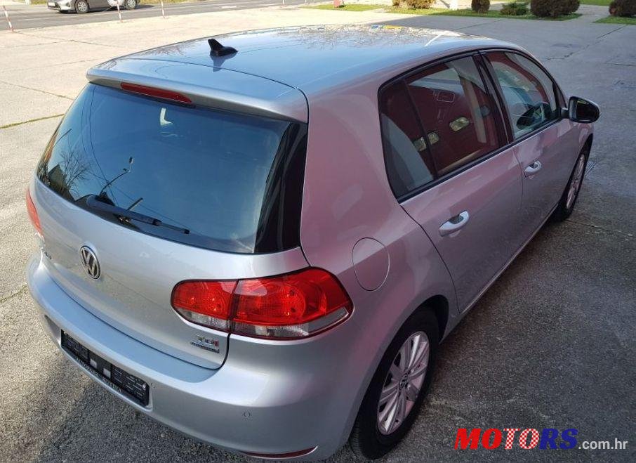 2012' Volkswagen Golf VI 1,6 Tdi photo #2