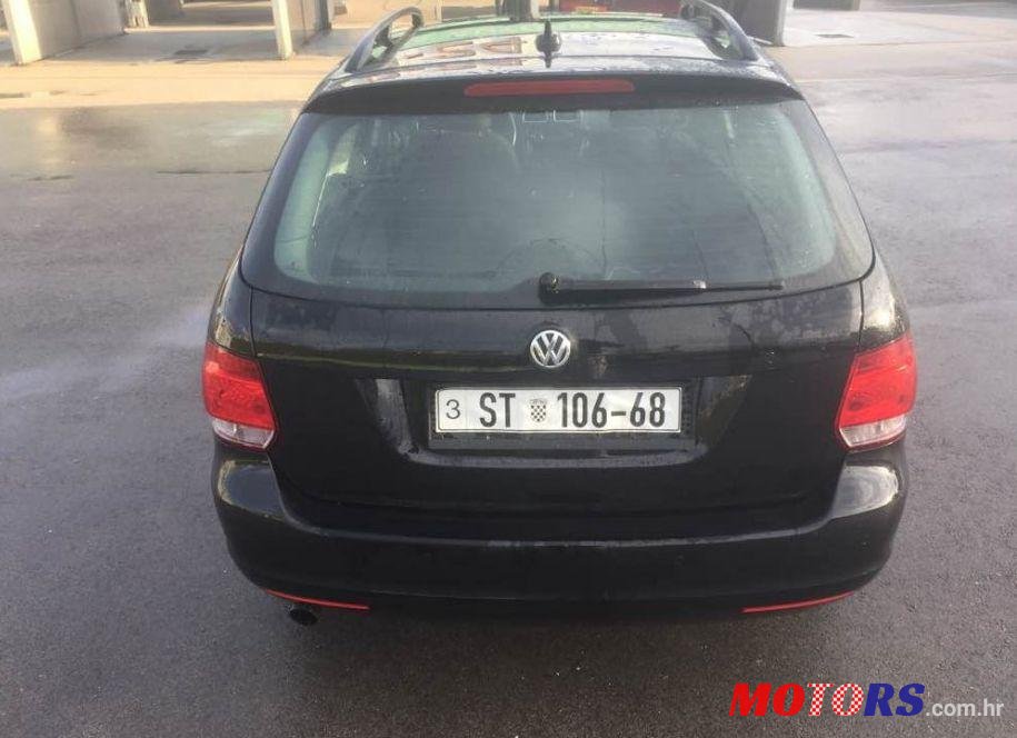 2012' Volkswagen Golf VI 1,6 Tdi photo #1