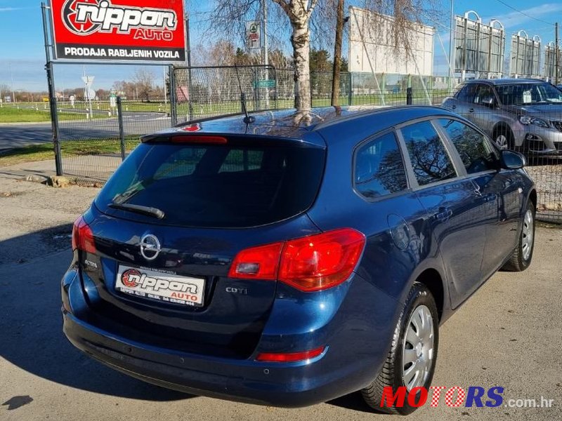 2011' Opel Astra Karavan photo #6