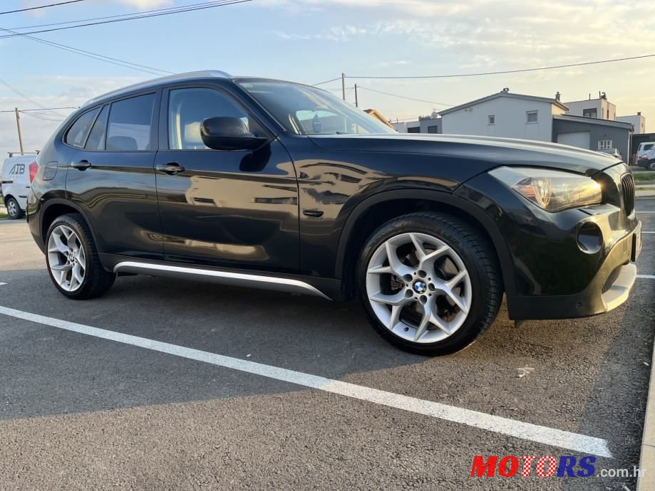 2011' BMW X1 Sdrive18D photo #4