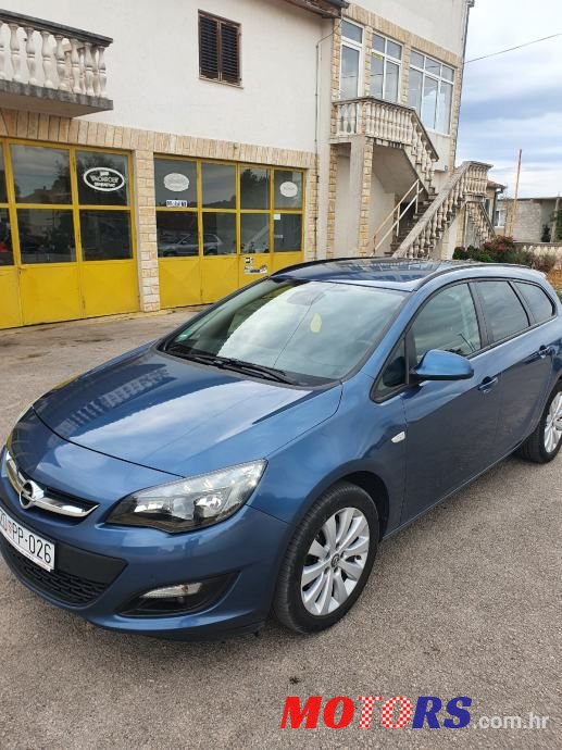 2015' Opel Astra Karavan photo #1