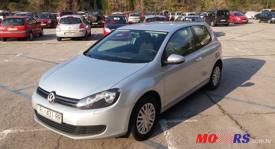 2010' Volkswagen Golf VI 1,6 Tdi photo #2
