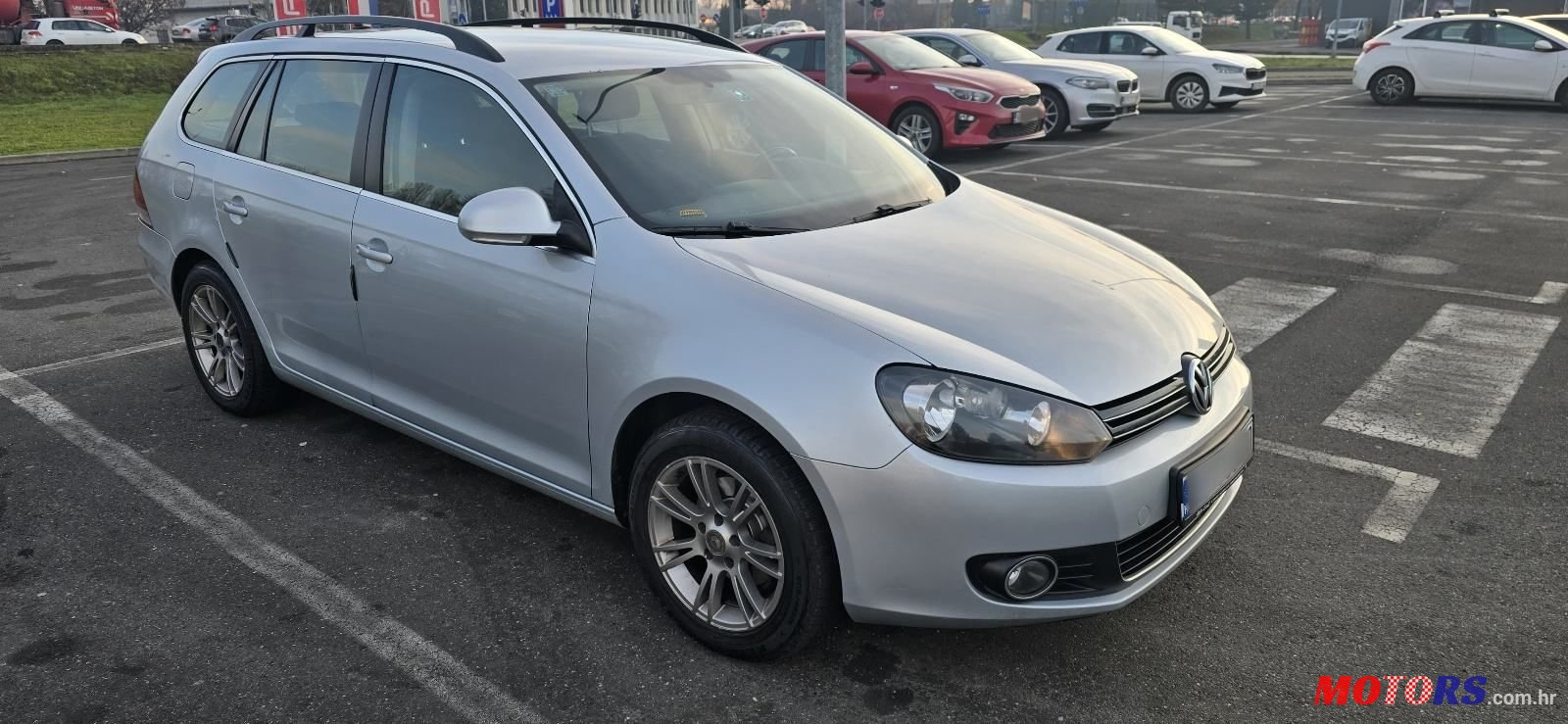 2012' Volkswagen Golf VI Variant photo #3