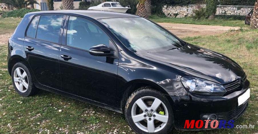 2011' Volkswagen Golf VI 1,6 Tdi photo #1