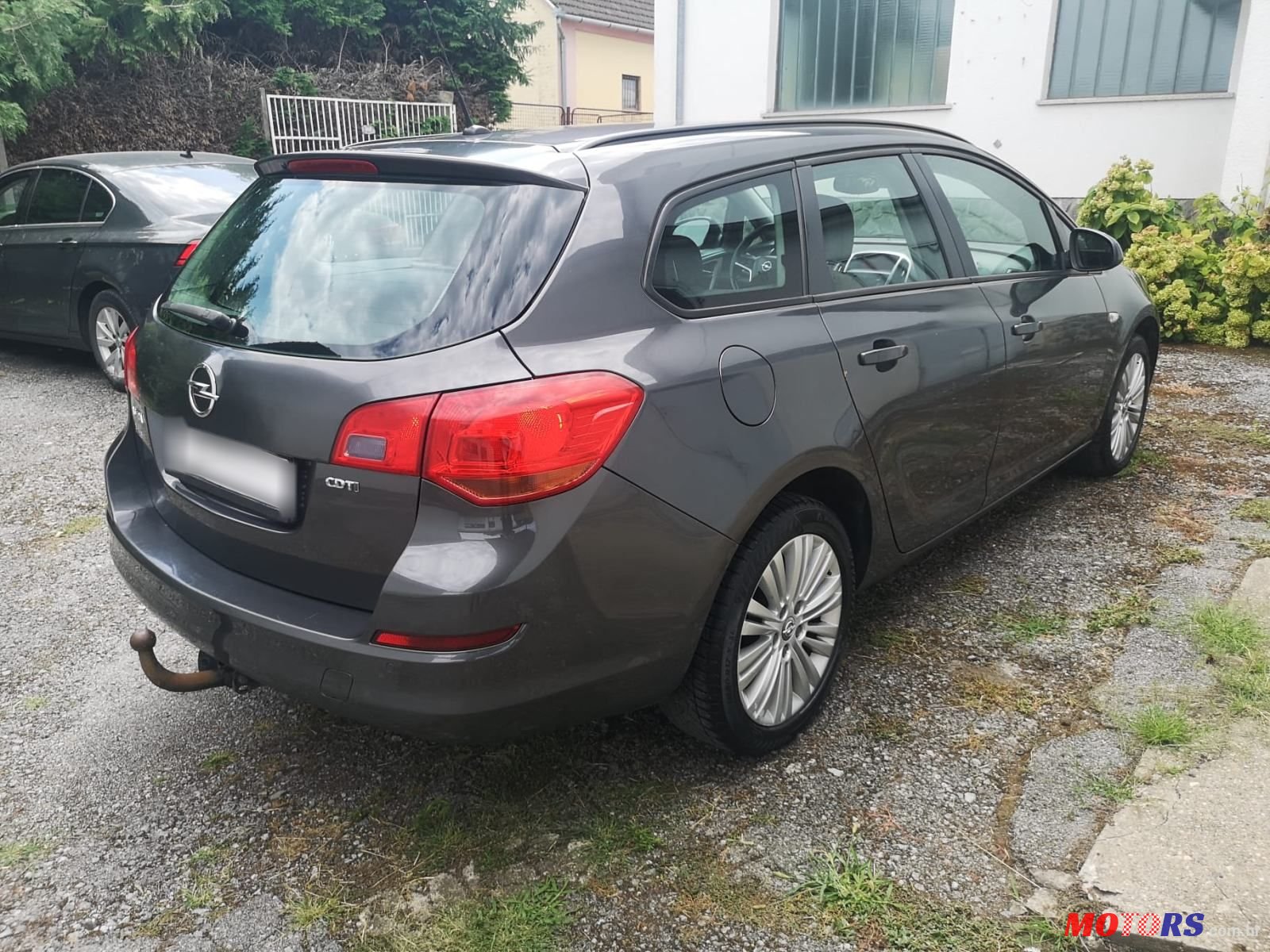 2012' Opel Astra Karavan photo #6