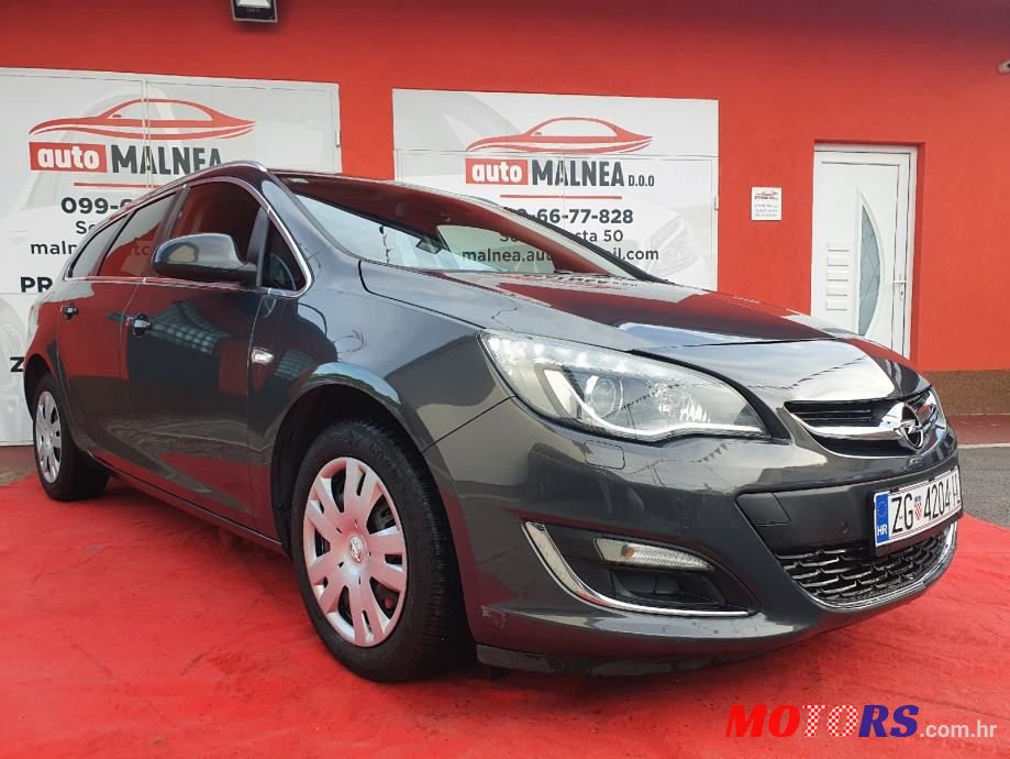 2013' Opel Astra Karavan photo #1