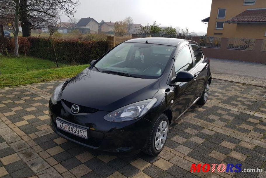2009' Mazda 2 Ce Pro photo #1