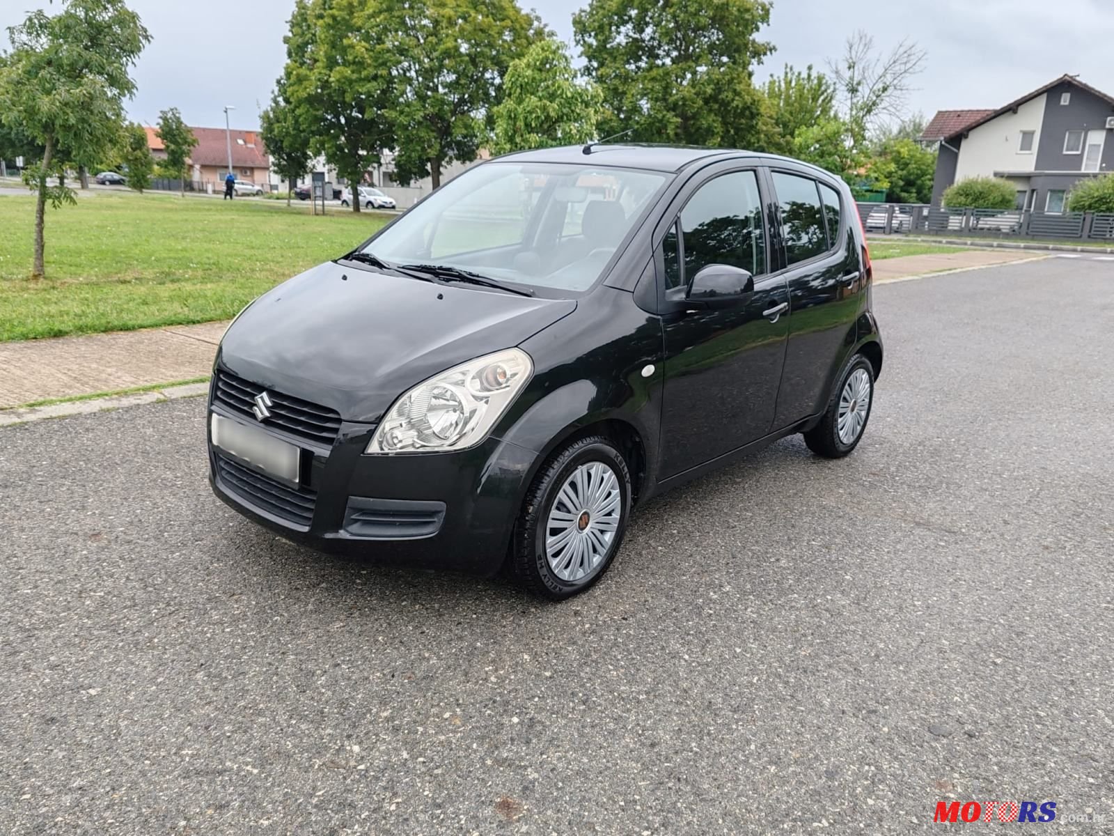 2008' Suzuki Splash 1,0 Gc photo #1