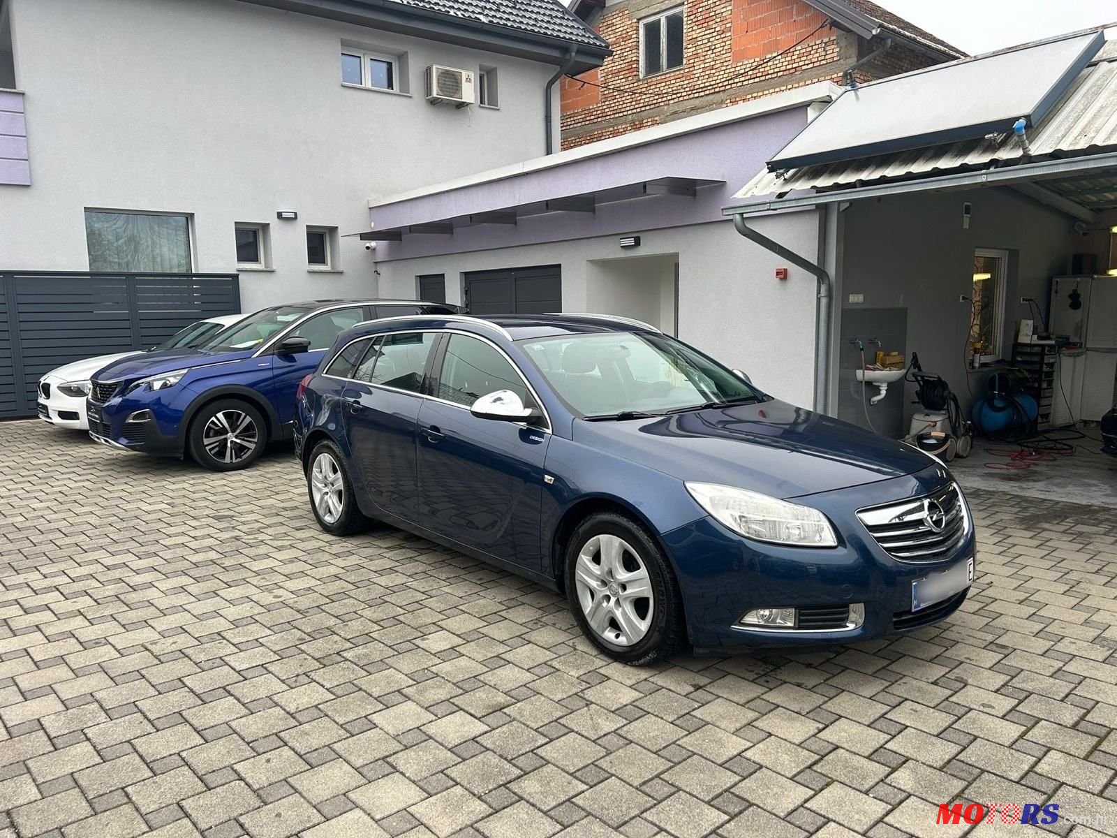 2012' Opel Insignia Karavan photo #1