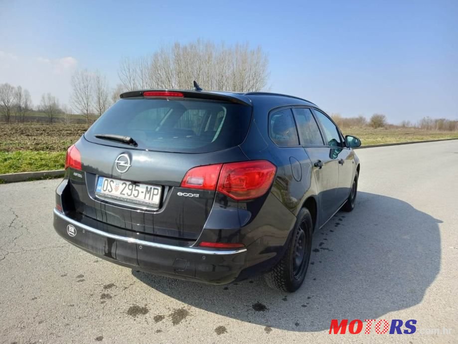 2014' Opel Astra Karavan photo #3