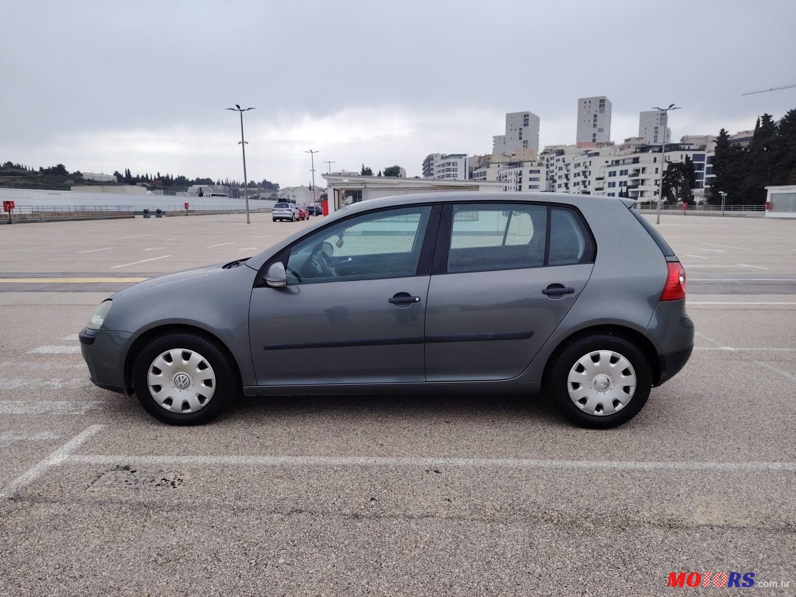 2004' Volkswagen Golf V 1,4 photo #3