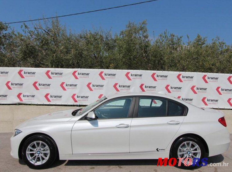 2014' BMW 3 Series 316D photo #1