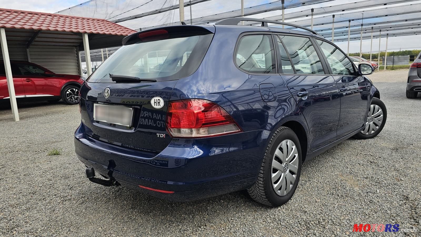 2012' Volkswagen Golf VI Variant photo #2