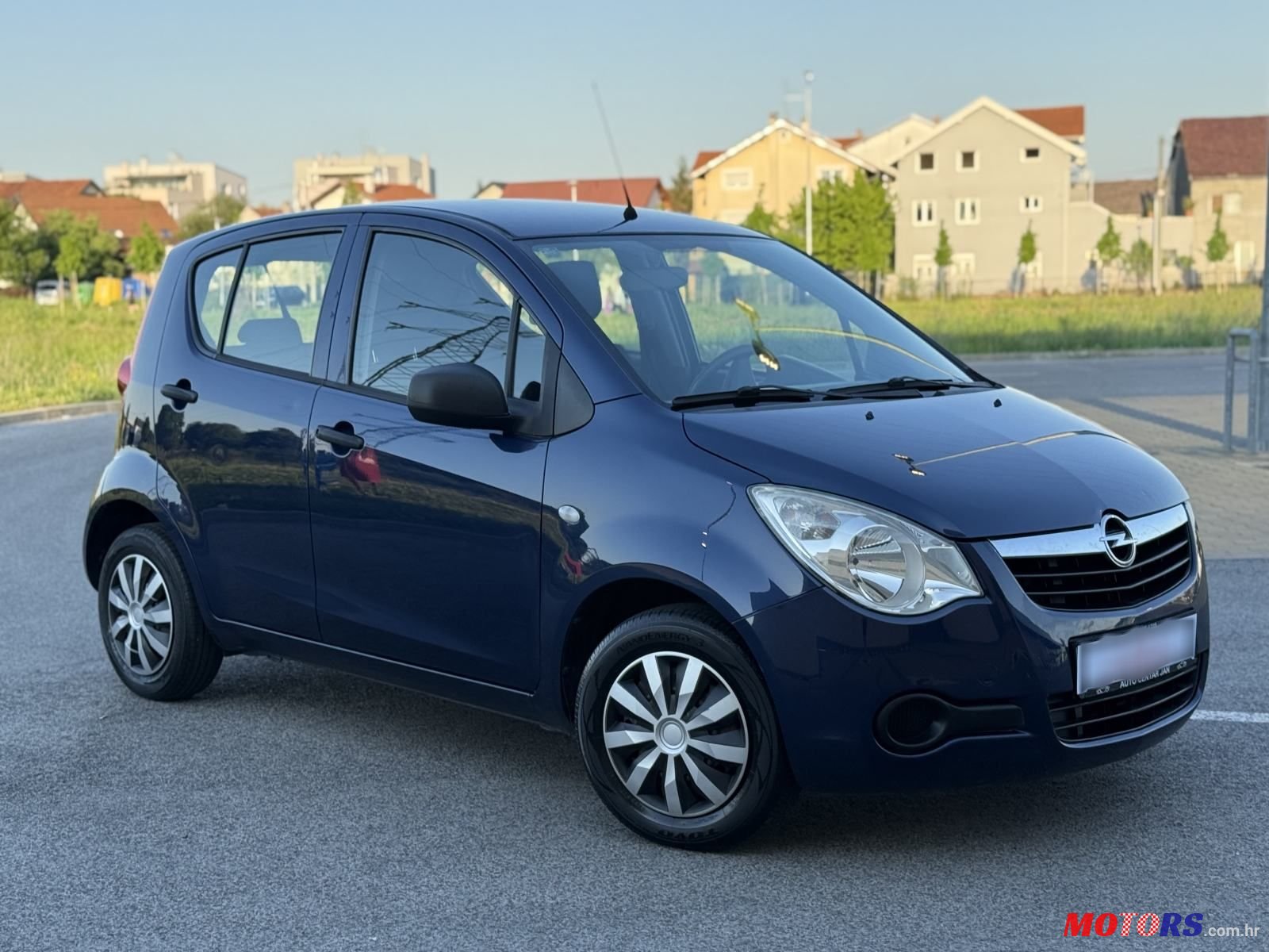 2009' Opel Agila 1,0 photo #1