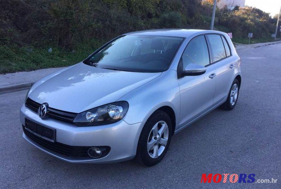2012' Volkswagen Golf VI 1,6 Tdi photo #1
