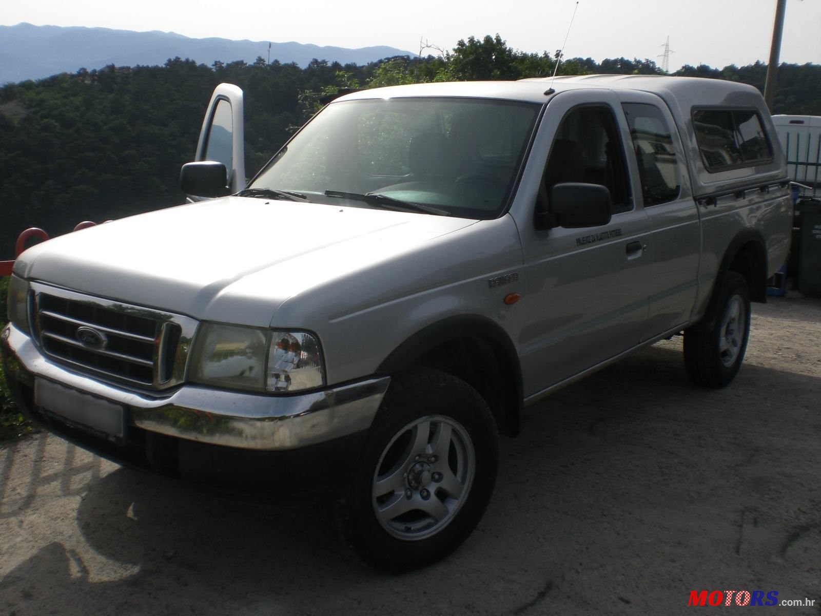 2003' Mazda B-2500 4X4Td photo #1
