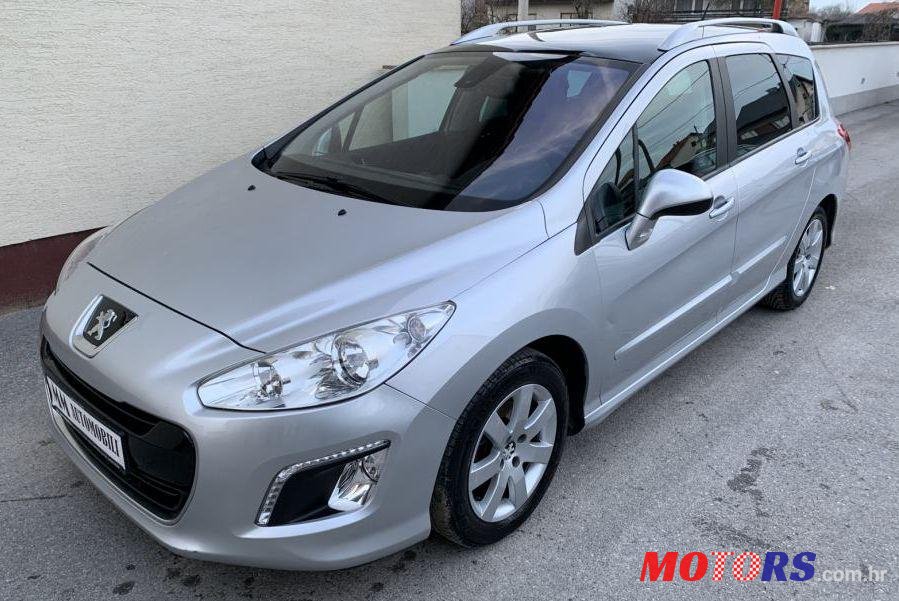 2012' Peugeot 308 Sw 1,6 E-Hdi photo #1