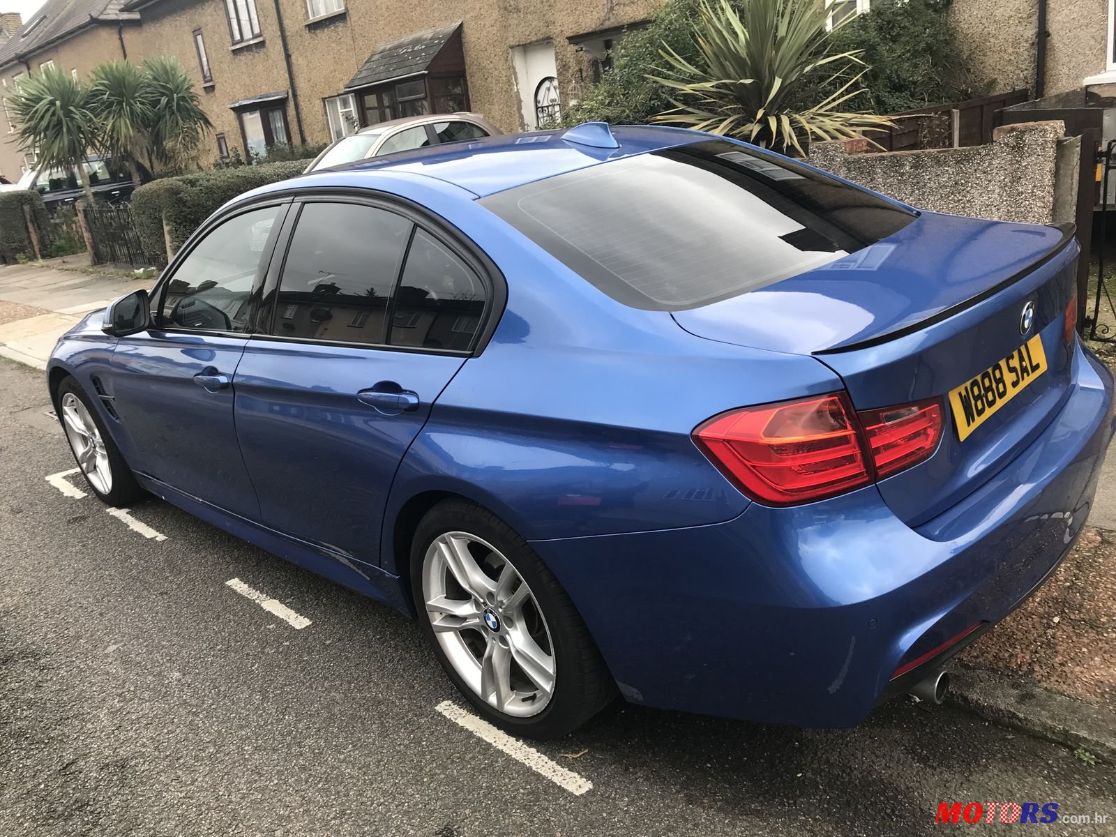 2012' BMW 3 Series M Sport with M3 wings photo #5