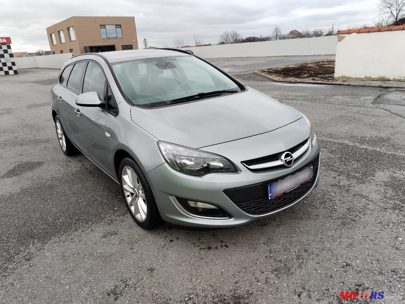 2013' Opel Astra Karavan photo #6