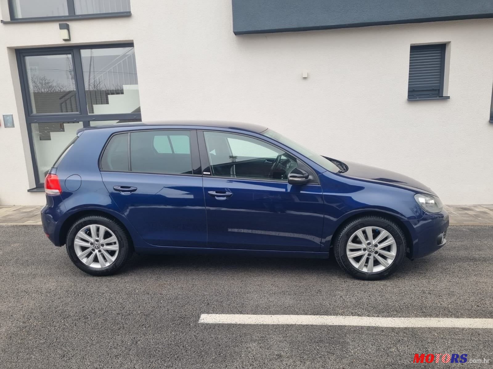 2012' Volkswagen Golf VI 1,6 Tdi photo #6