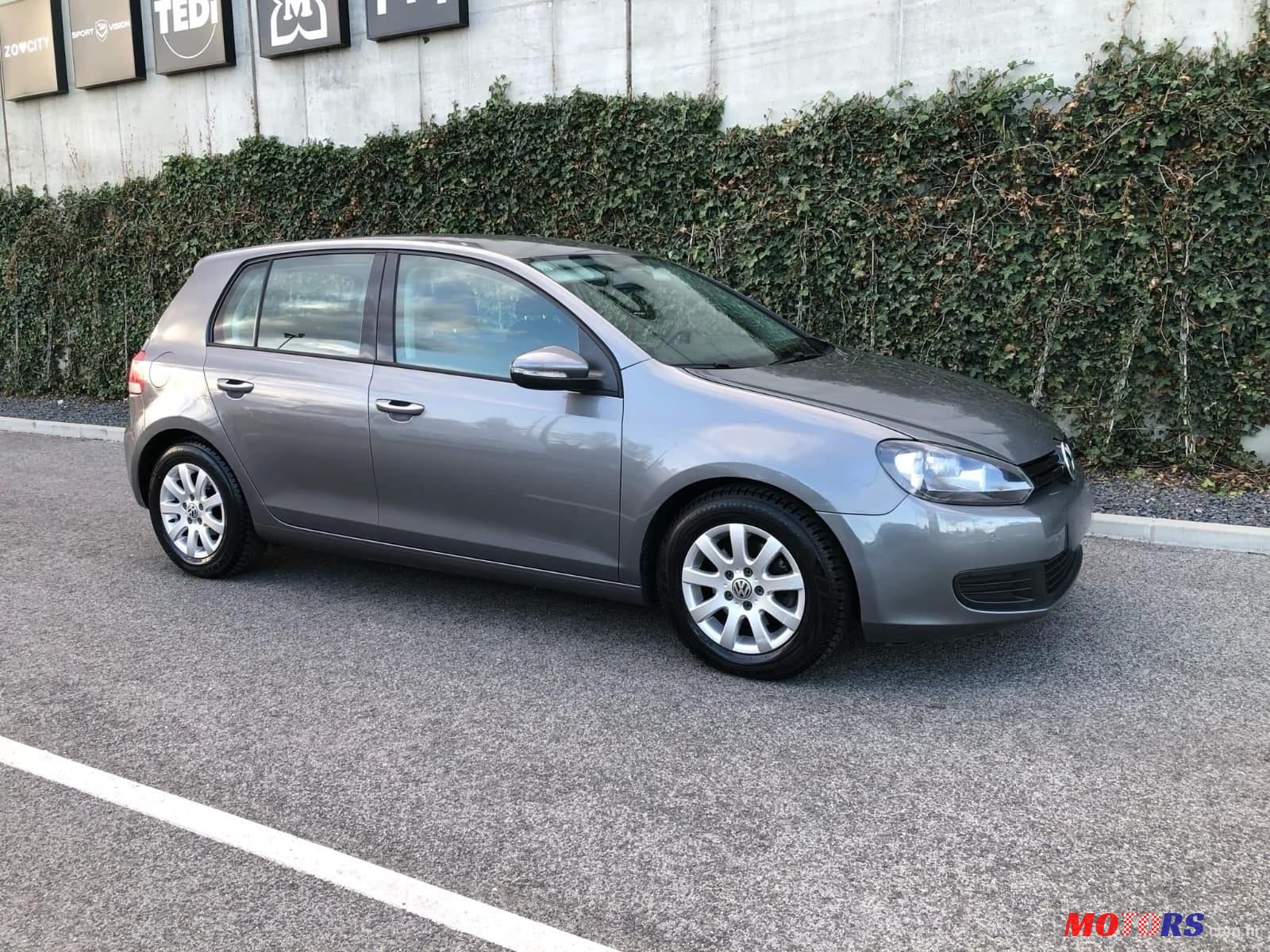 2011' Volkswagen Golf VI 1,6 Tdi photo #1