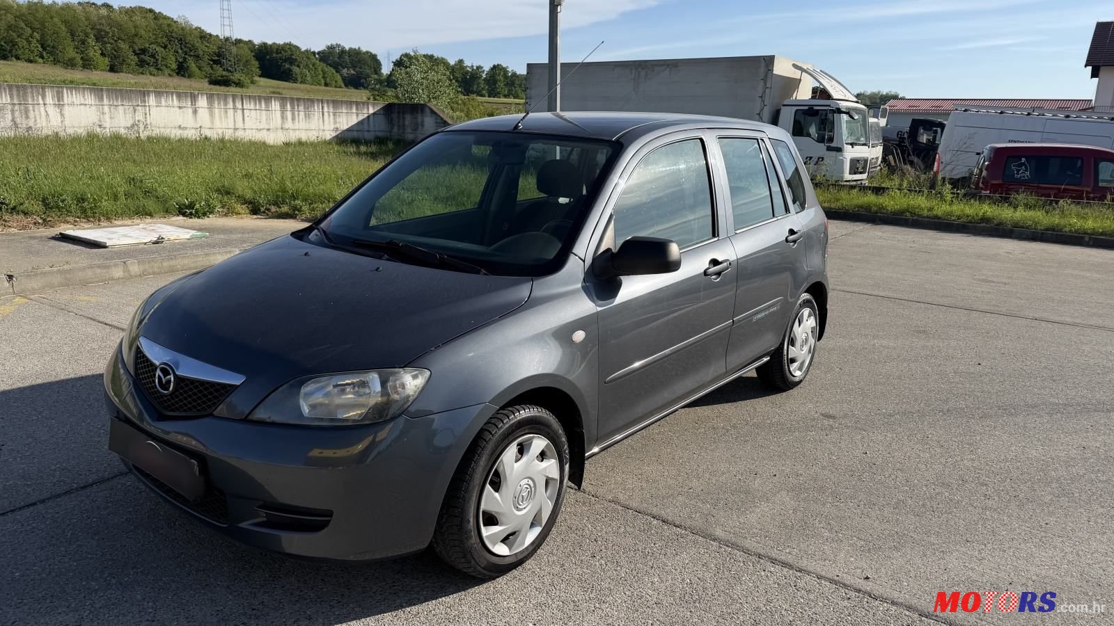 2005' Mazda 2 Cd68 photo #1