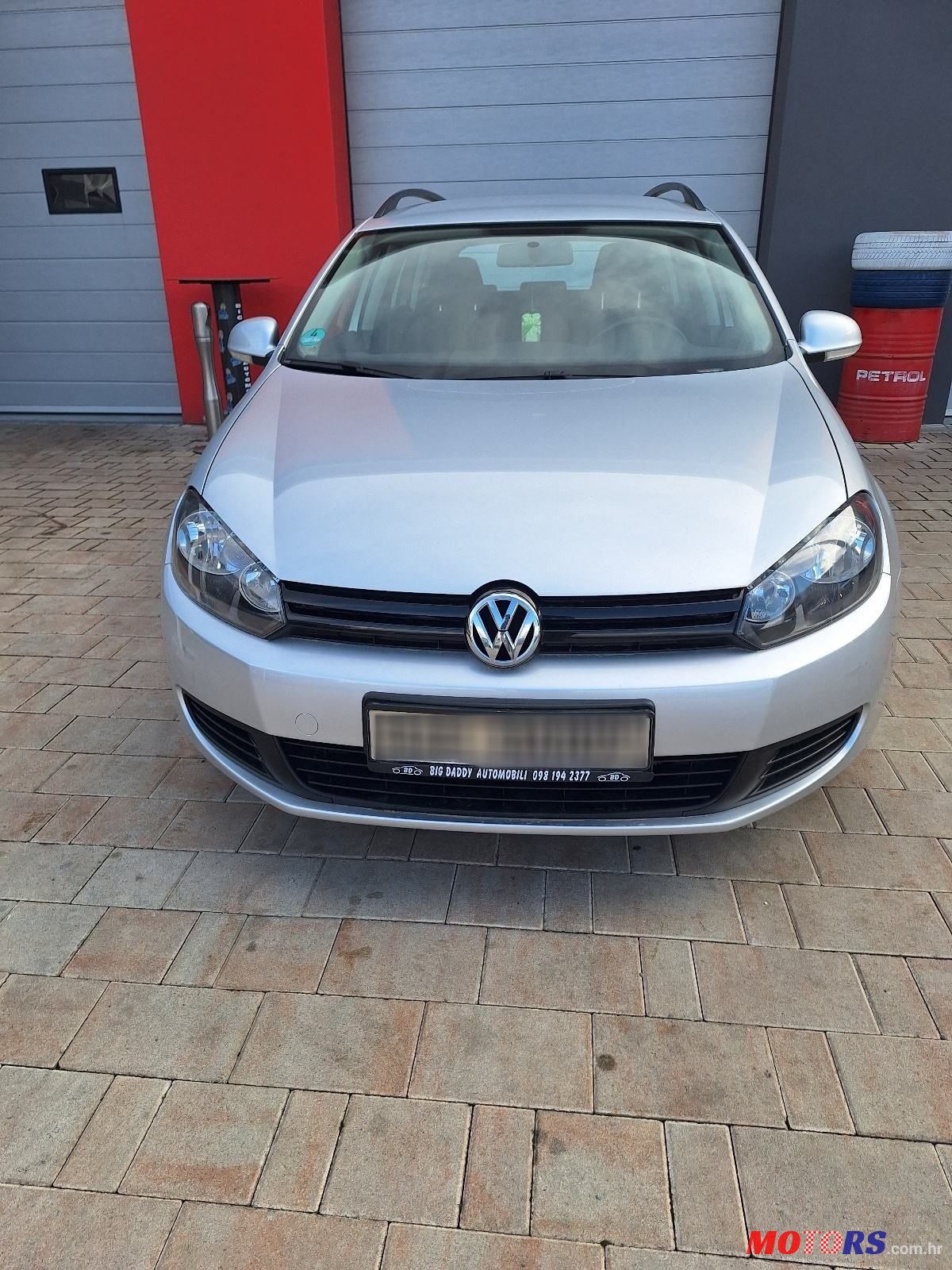 2011' Volkswagen Golf VI Variant photo #1