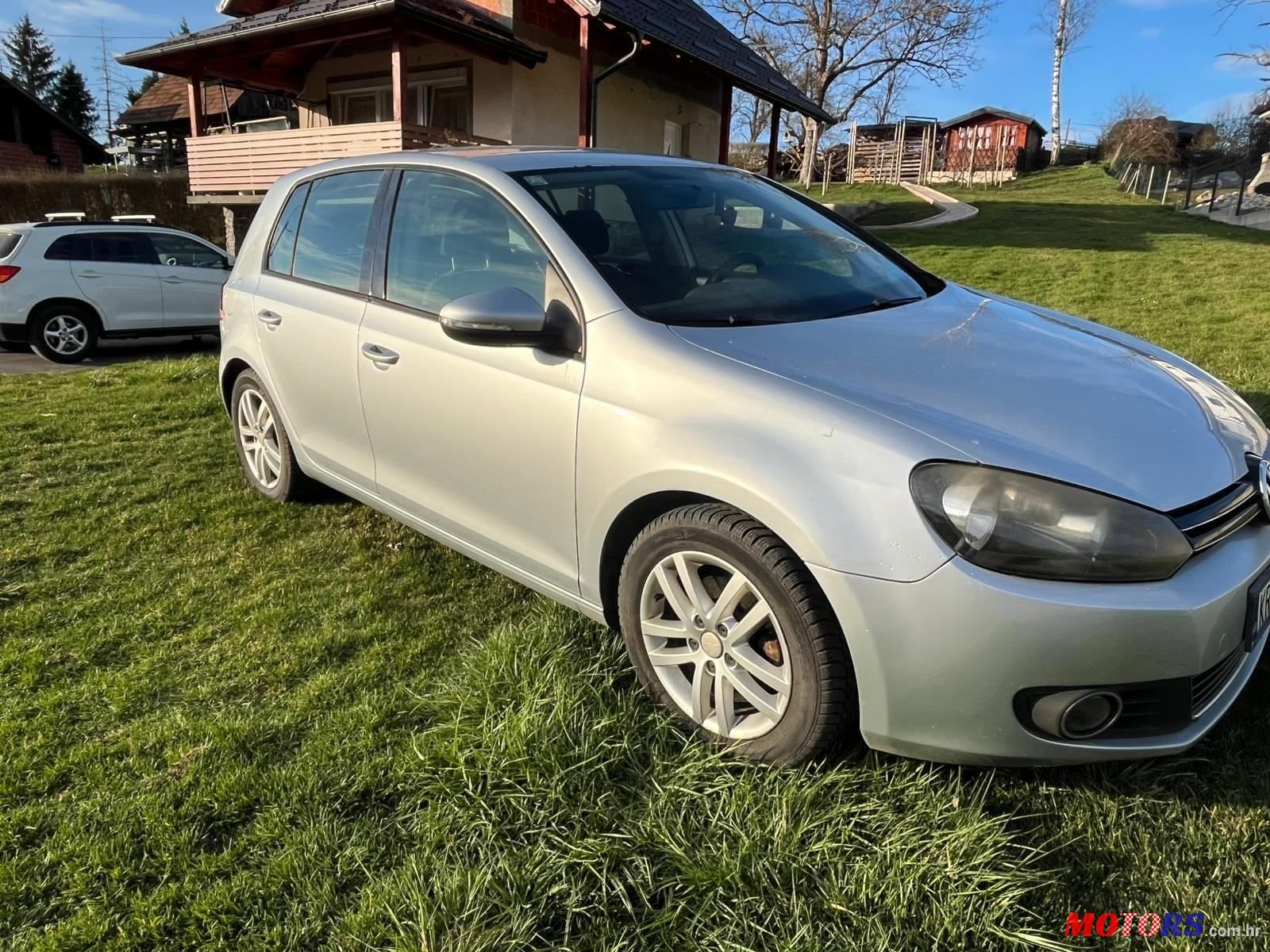 2010' Volkswagen Golf VI 1,6 Tdi photo #3