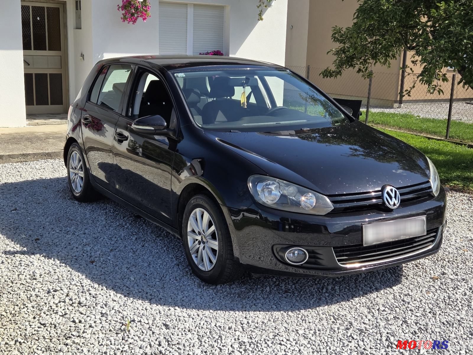 2012' Volkswagen Golf VI photo #3