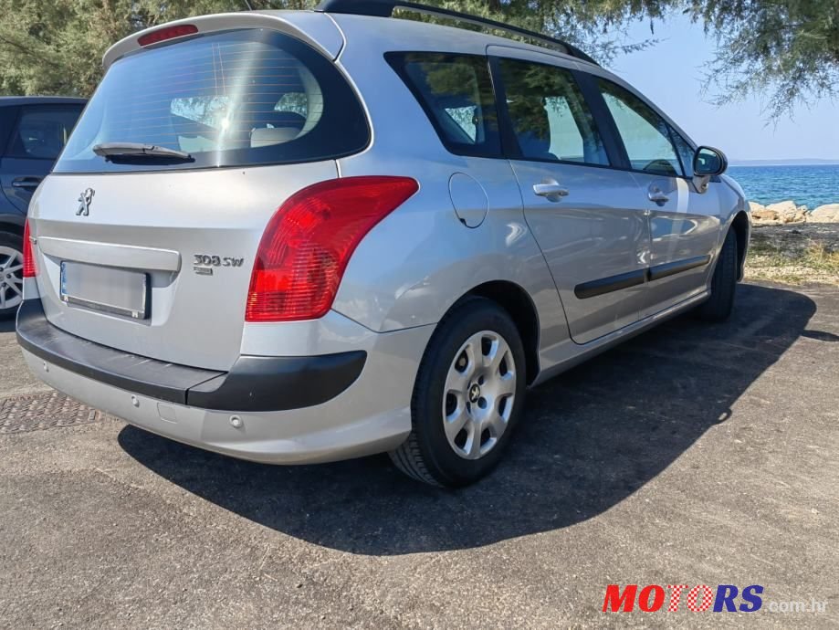 2011' Peugeot 308 Sw photo #3