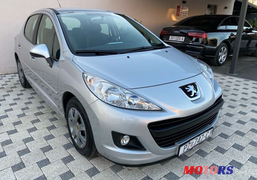2011' Peugeot 207 1,4 photo #1