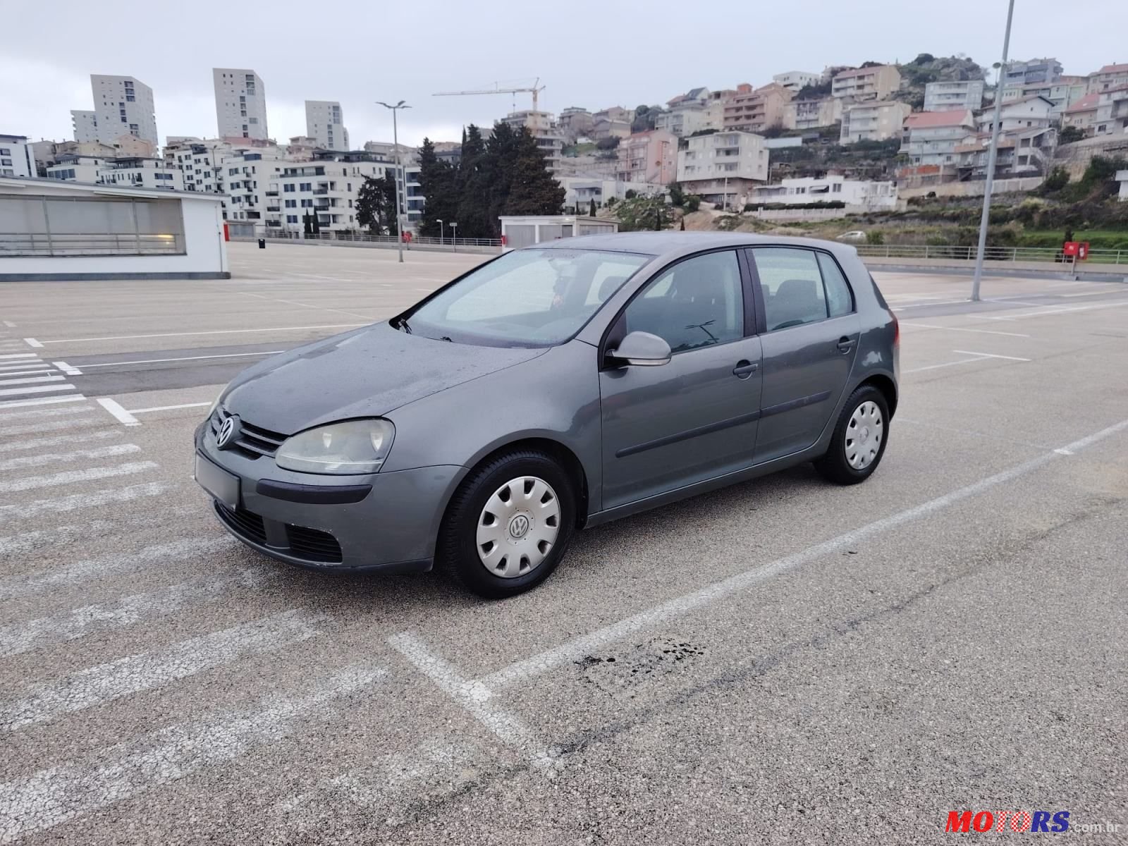 2004' Volkswagen Golf V 1,4 photo #2