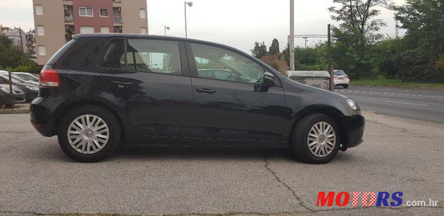 2011' Volkswagen Golf VI 1,6 Tdi photo #1
